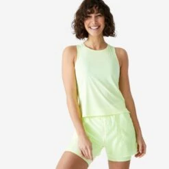 Camiseta Fitness Sin Mangas Tirantes Holgada Mujer Domyos Blanco -Equipo De Fitness camiseta fitness tirantes holgada mujer domyos 520 amarillo