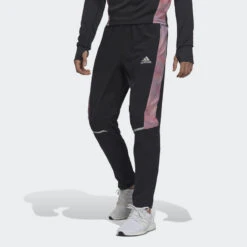 ADIDAS Pantalón Own The Run Colorblock